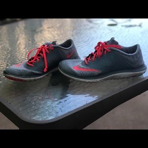 Gray Nike Running Tennis Shoes.